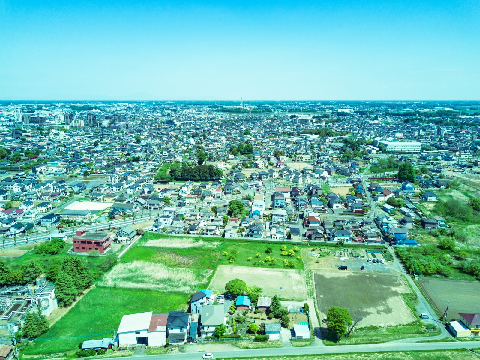 上空100m付近の街並みの写真素材 ぱくたそ