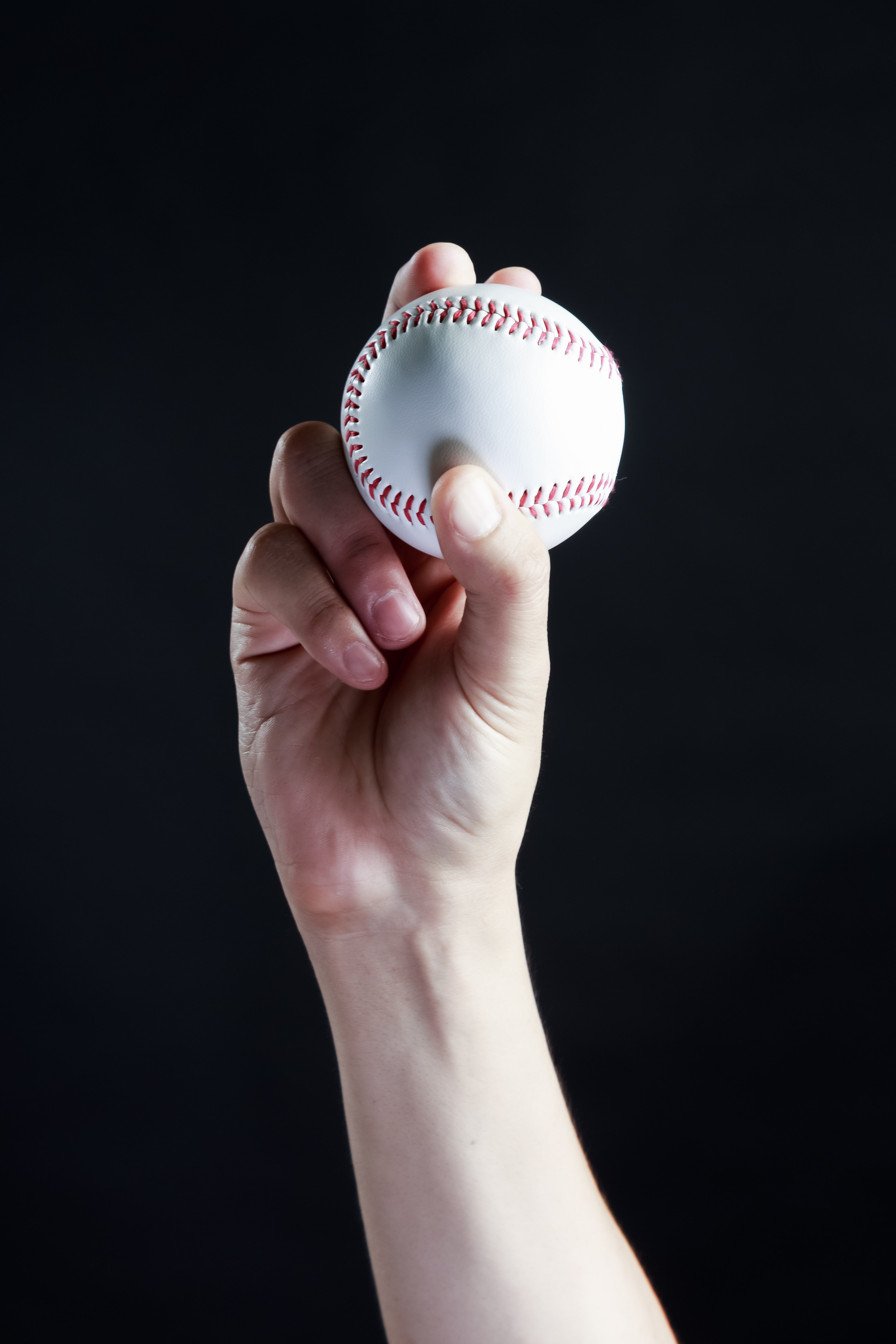 カーブ 変化球 の握り方の写真素材 ぱくたそ