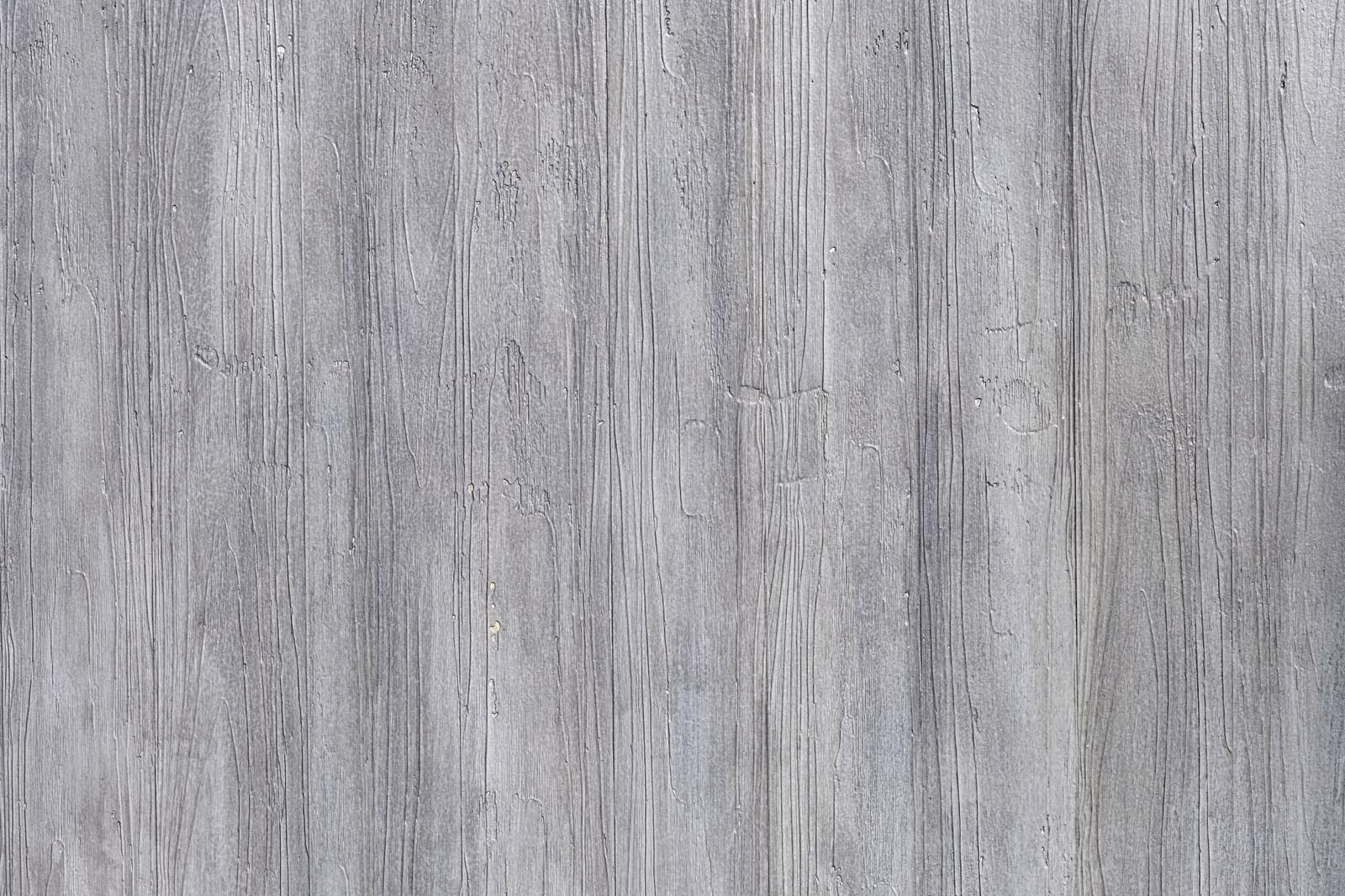 「灰色に塗られた木目調の壁（テクスチャ）」の写真