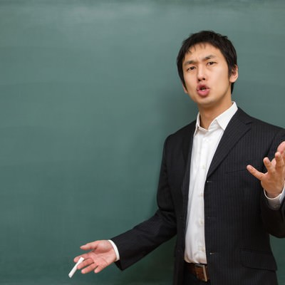 「いつやるの？進路指導する先生」の写真素材