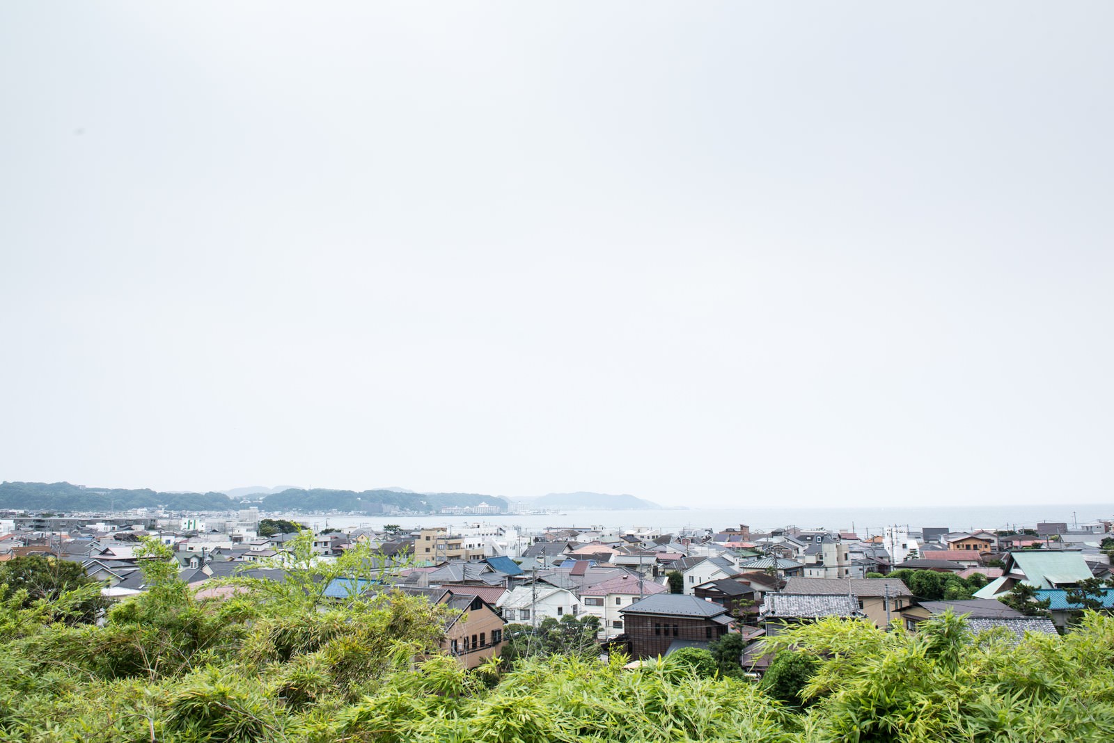 海沿いの街並みの写真素材 ぱくたそ