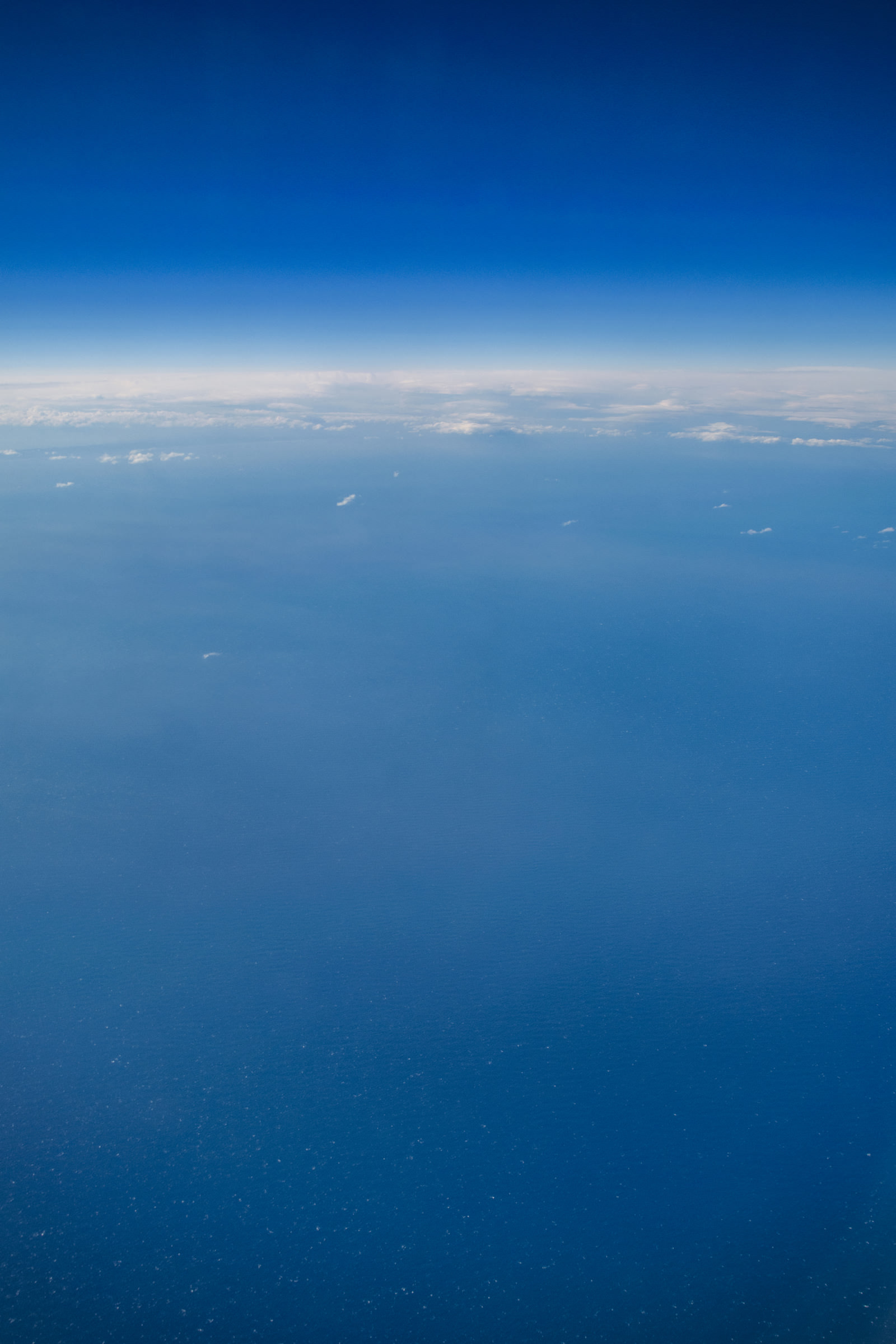 飛行機から見た海と空の写真素材 ぱくたそ