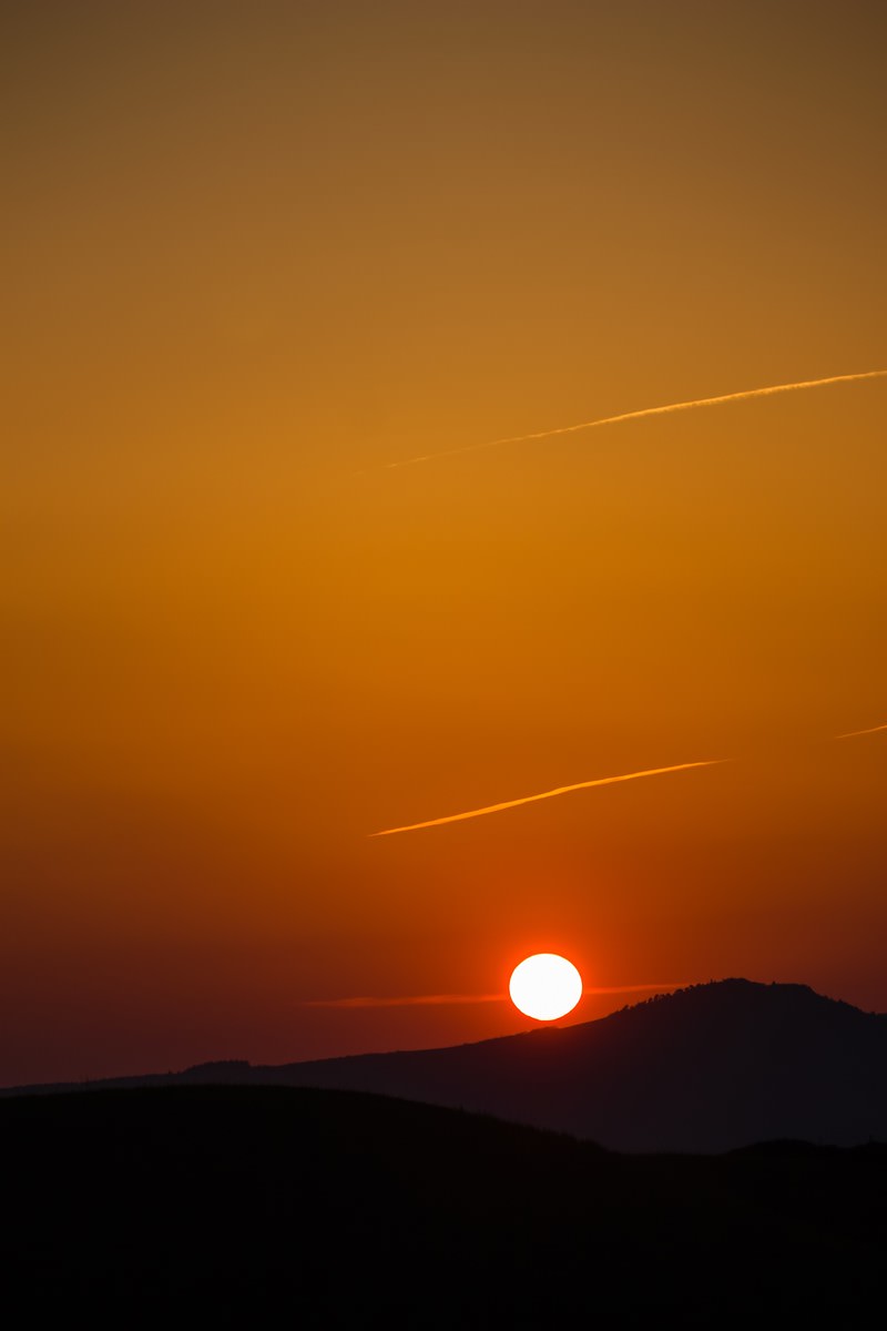 阿蘇からの夕日 フリー素材のぱくたそ