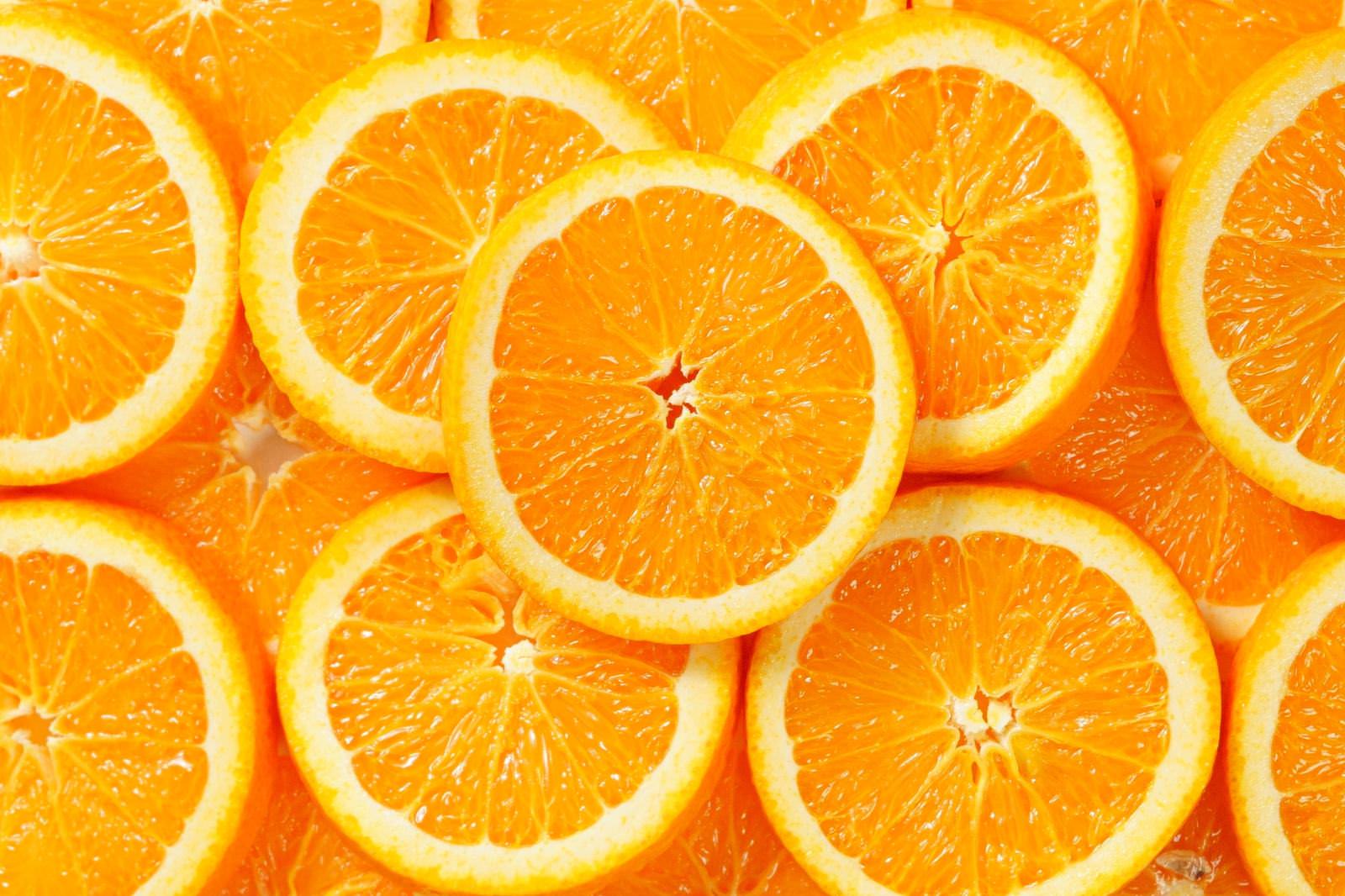 「輪切りにしたオレンジ | フリー素材のぱくたそ」の写真