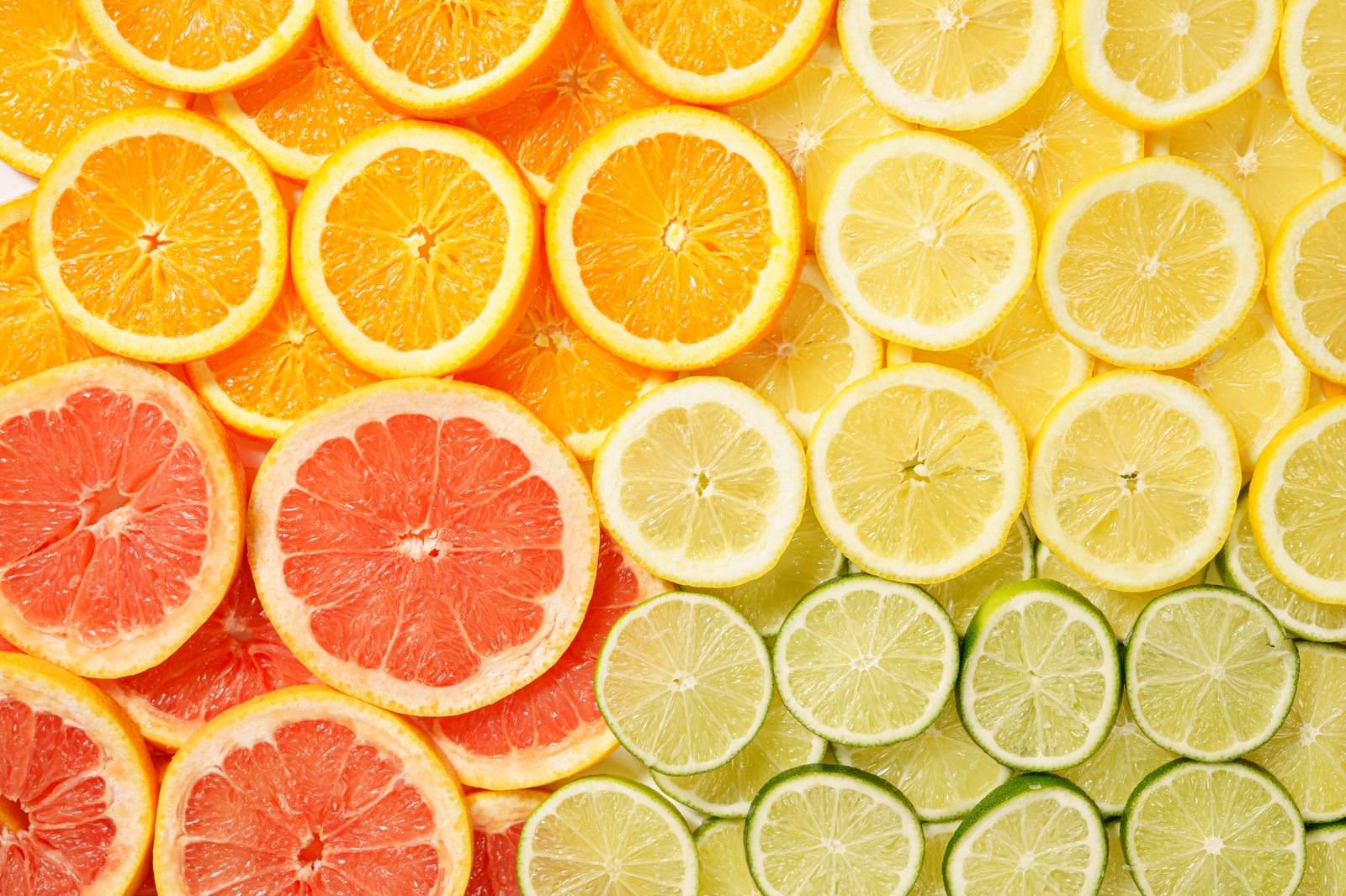 「カットした柑橘類のテクスチャー | フリー素材のぱくたそ」の写真