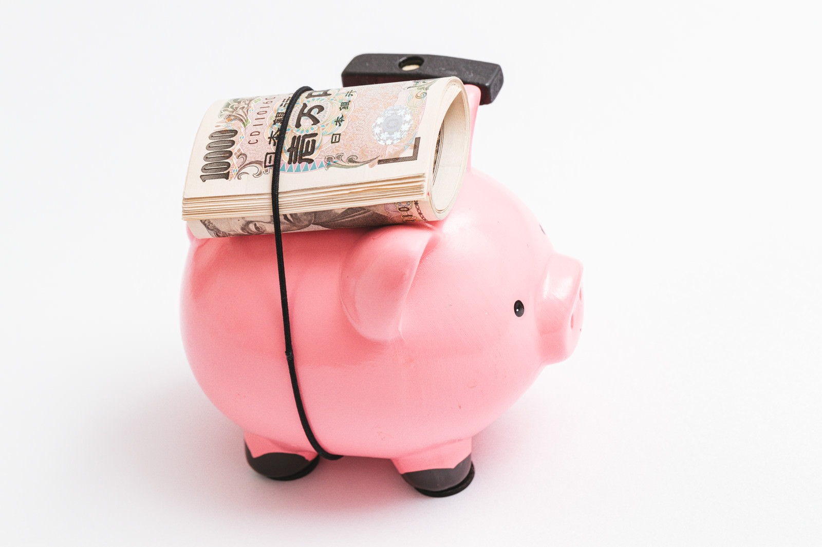「1万円札専用の豚の貯金箱」の写真