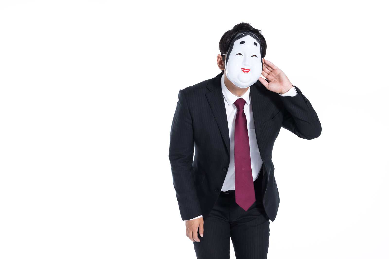 内心は小馬鹿にしながら謝ったふりをする会社員 無料の写真素材は 内心は小馬鹿にしながら謝ったふりをする会社員 無料の写真素材は
