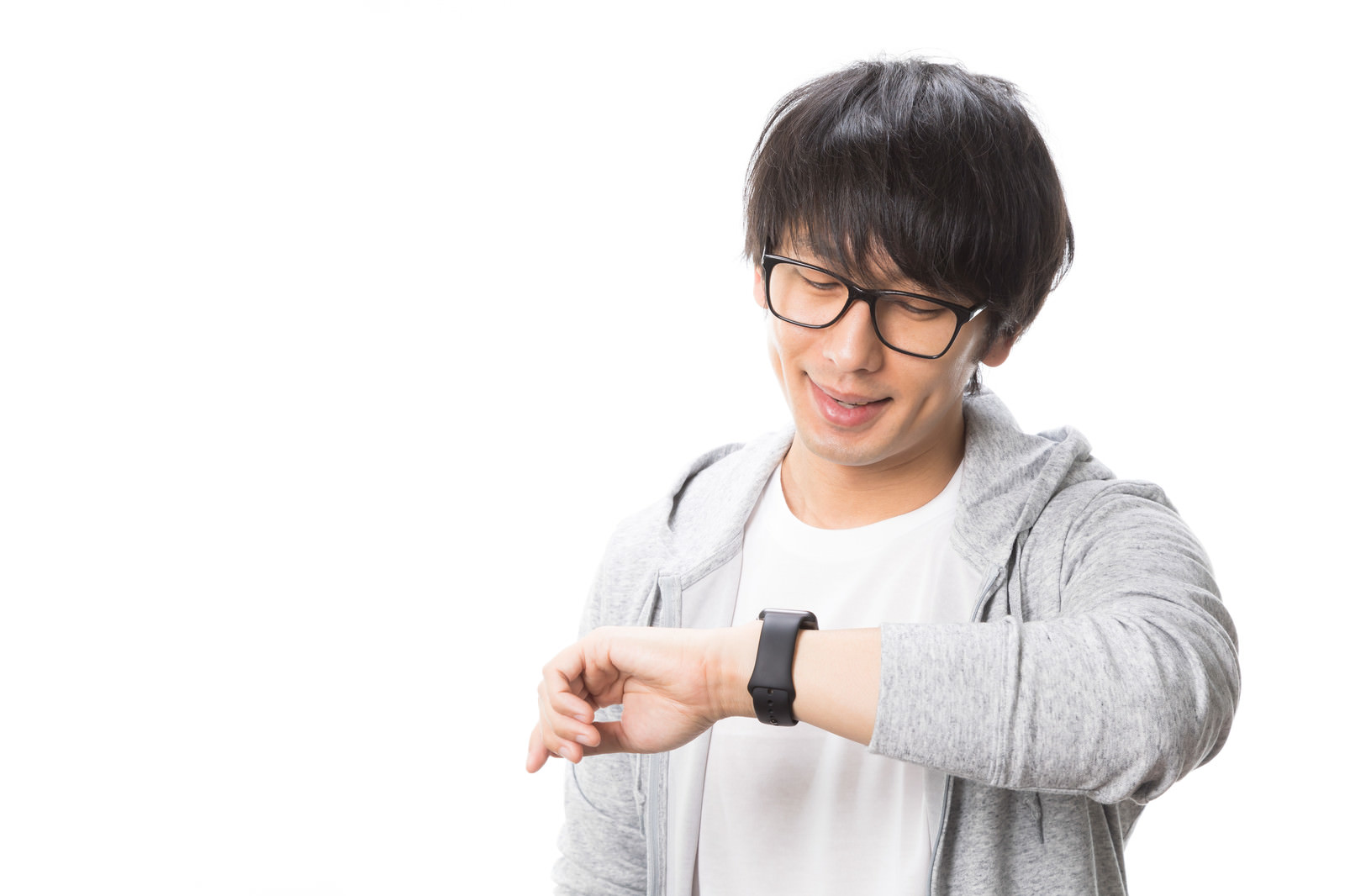 「Apple Watchで通知を確認する男性」の写真［モデル：大川竜弥］