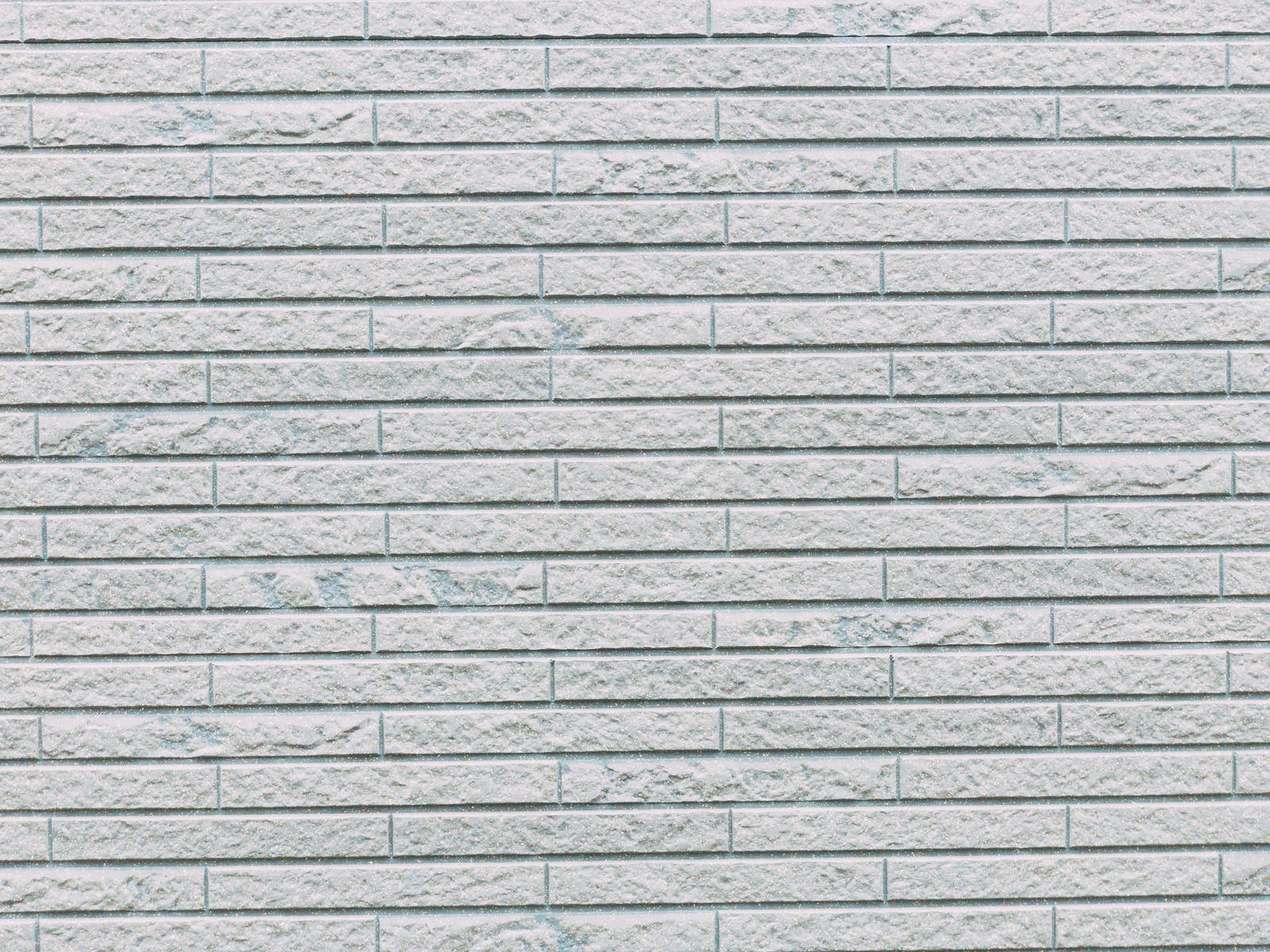 「新築の外壁タイル（テクスチャー） | フリー素材のぱくたそ」の写真