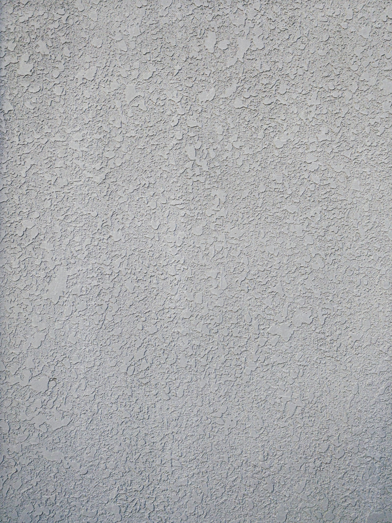 「モルタルの外壁（テクスチャー） | フリー素材のぱくたそ」の写真